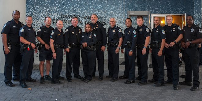 Sunny Isles Beach Police Department Officer stand in a line for a photo.