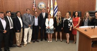 Posted photo of City officials from Sunny Isles Beach and Punta del Este, Uruguay announcing the new Sister City partnership.
