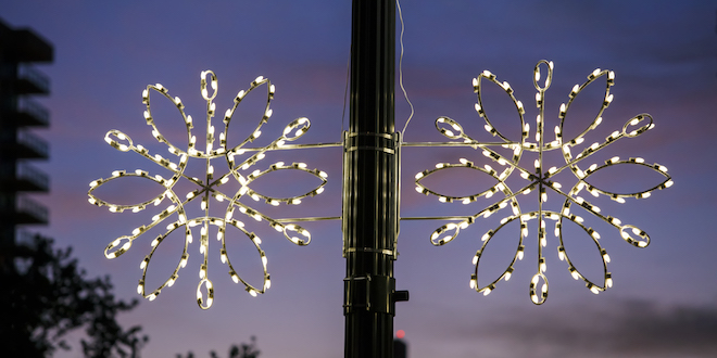 Holiday decoration snowflakes on lightpost