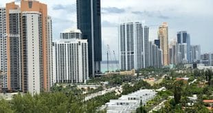 View of Golden Shores neighborhood, Collins Ave and City skyline.