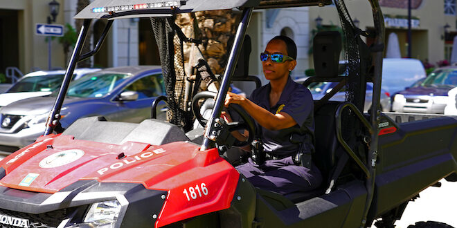Detective Sasee Morales driving an ATV