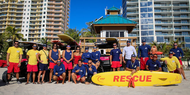 Group photo of Ocean Rescue on lifeguard stand