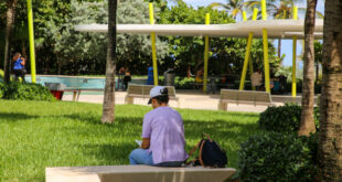 Woman reading in Samson Oceanfront Park