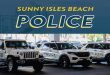 Sunny Isles Beach Police. Three police vehicles lined up in parking lot.