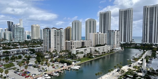 Aerial view of intracoastal waterway and city skyline.